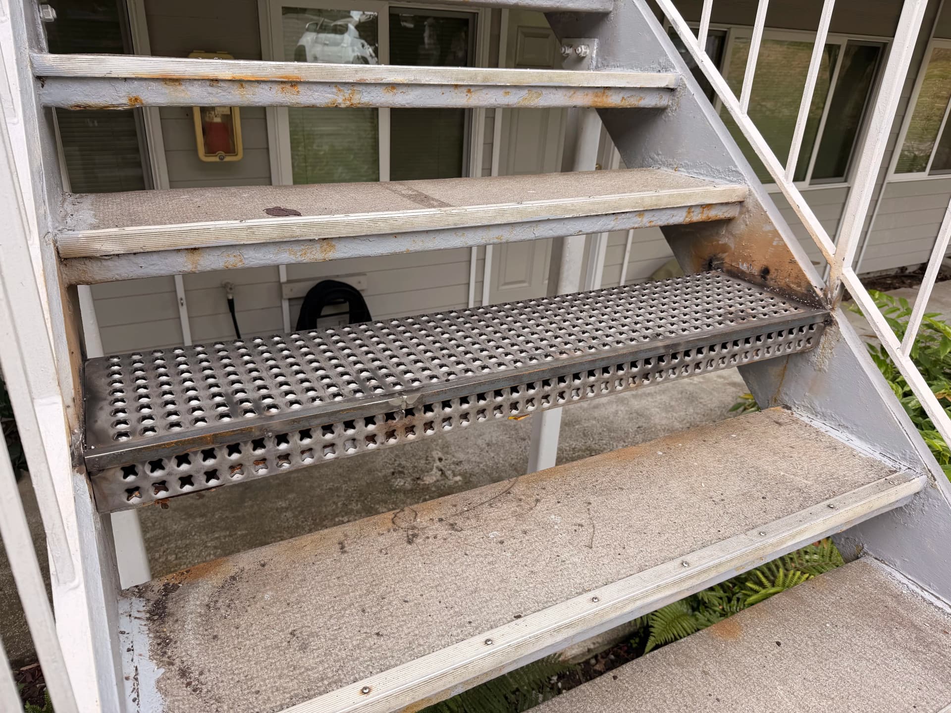 Rotten Stair Tread Replaced with Metal Upgrade in Fairhaven