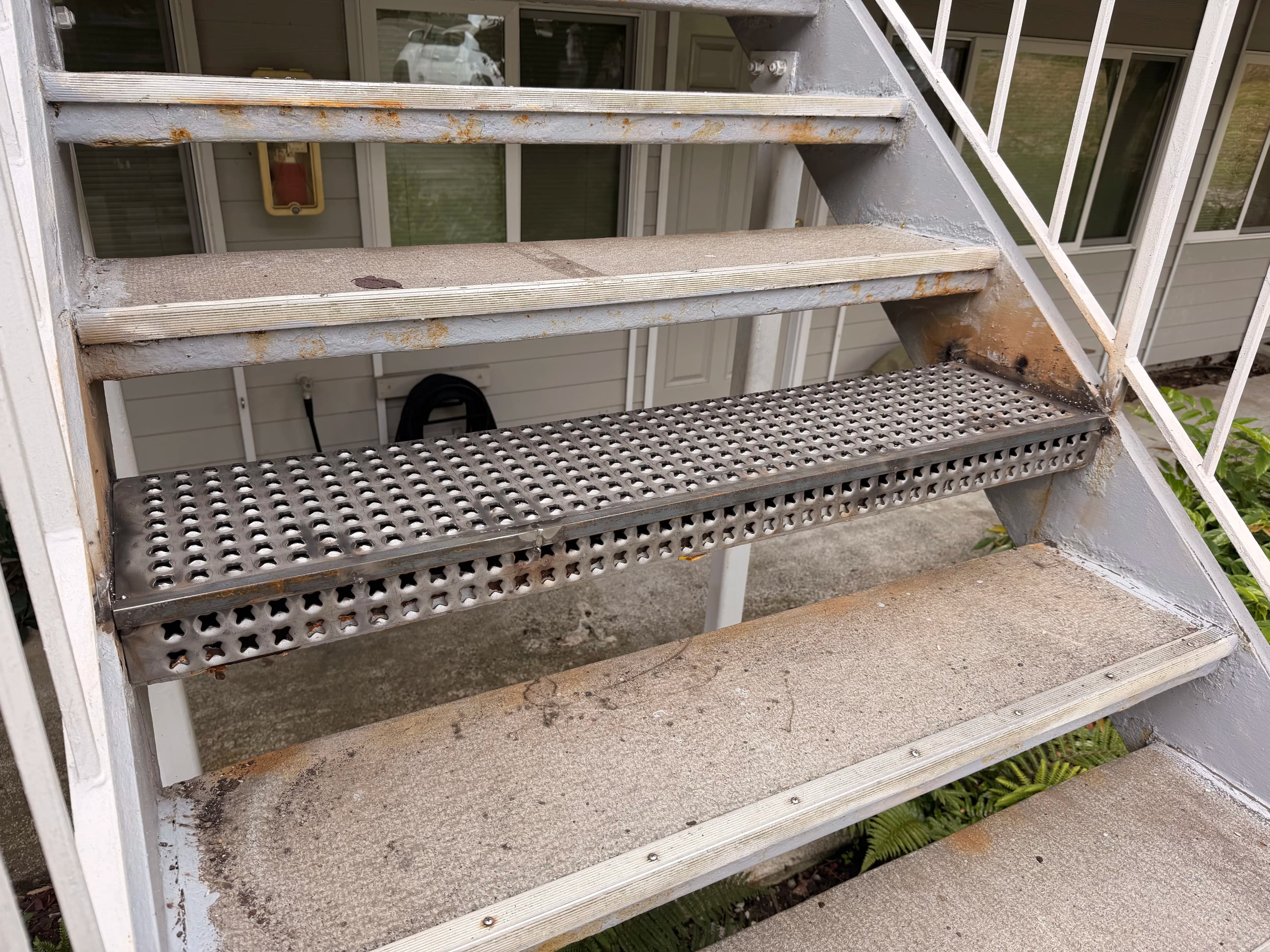 Project Rotten Stair Tread Replaced with Metal Upgrade in Fairhaven image
