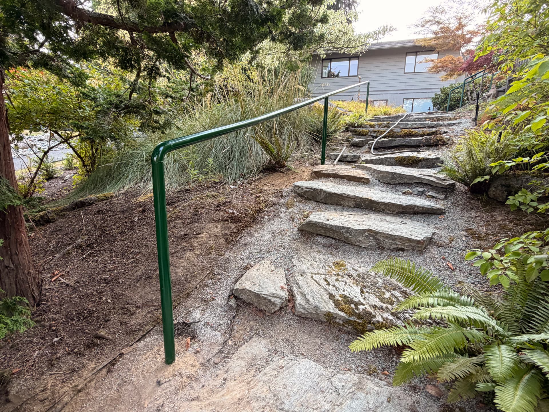 Gallery photos for Two Custom Hand Rails Built for a Lakeside Stone Path: Image #1