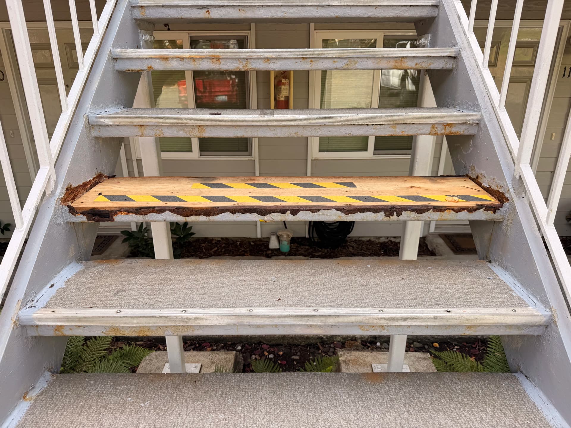 Rotten Stair Tread Replaced with Metal Upgrade in Fairhaven