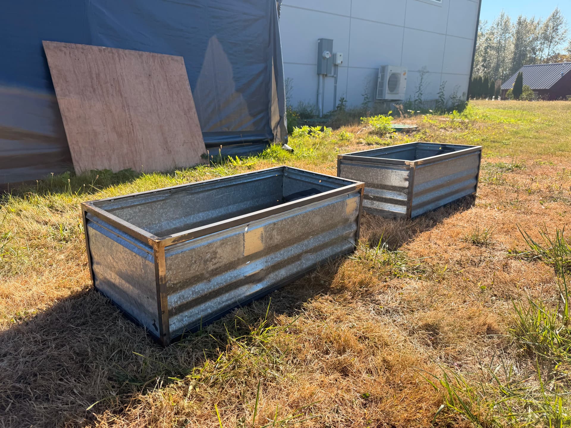 Custom Planter Boxes Built from Reclaimed Roofing Metal for a Local Nursery