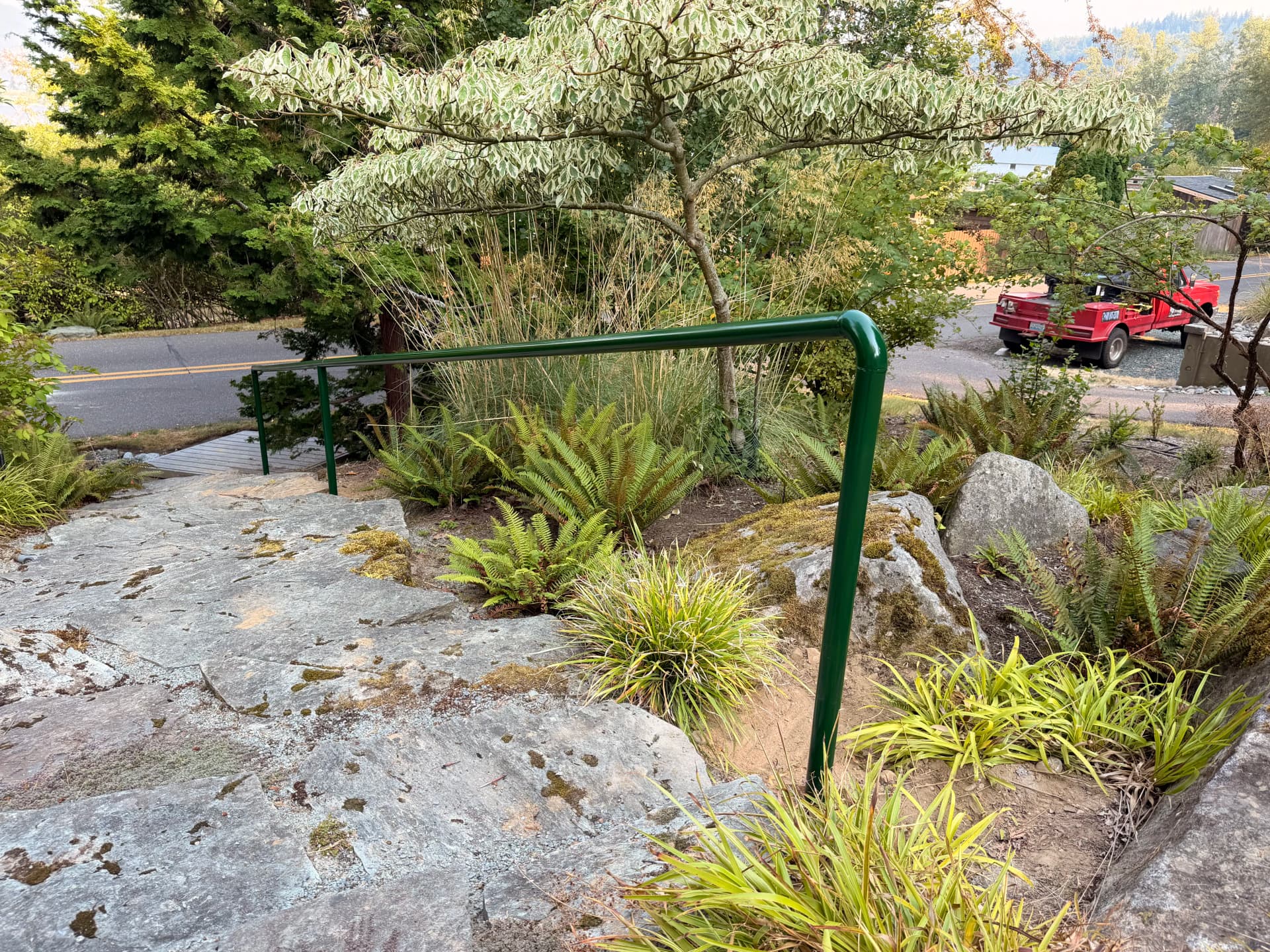 Two Custom Hand Rails Built for a Lakeside Stone Path image
