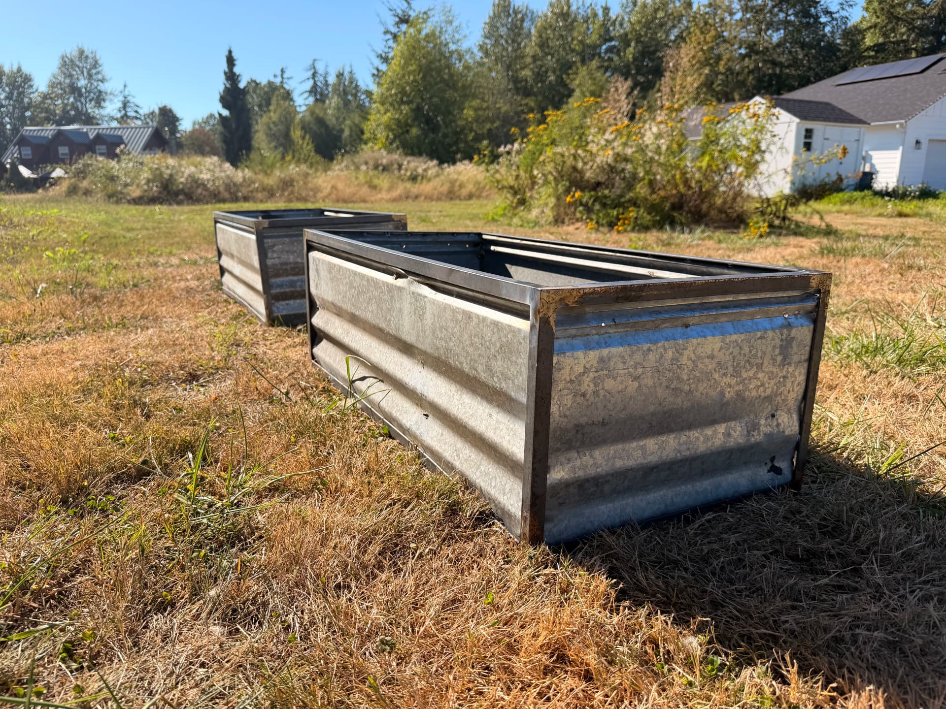 Custom Planter Boxes Built from Reclaimed Roofing Metal for a Local Nursery