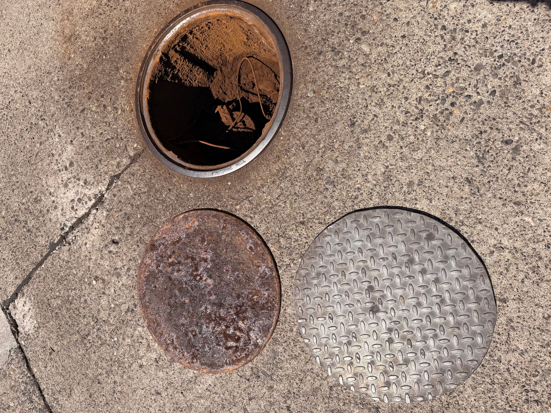 Gallery photos for Gas Station Monitoring Well Cover Swap - Old Rust Out, New Steel In: Image #3