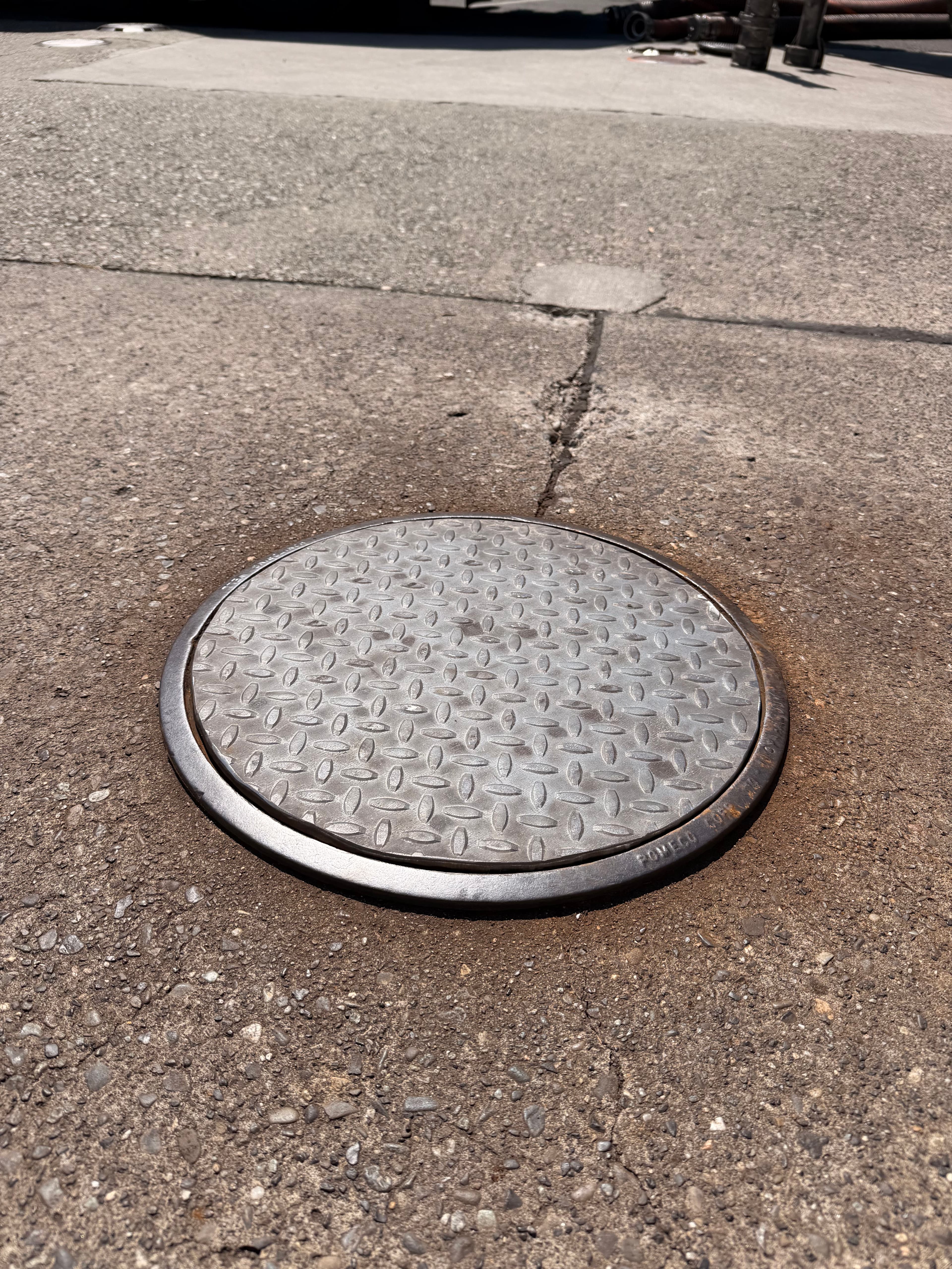 Project Gas Station Monitoring Well Cover Swap - Old Rust Out, New Steel In image