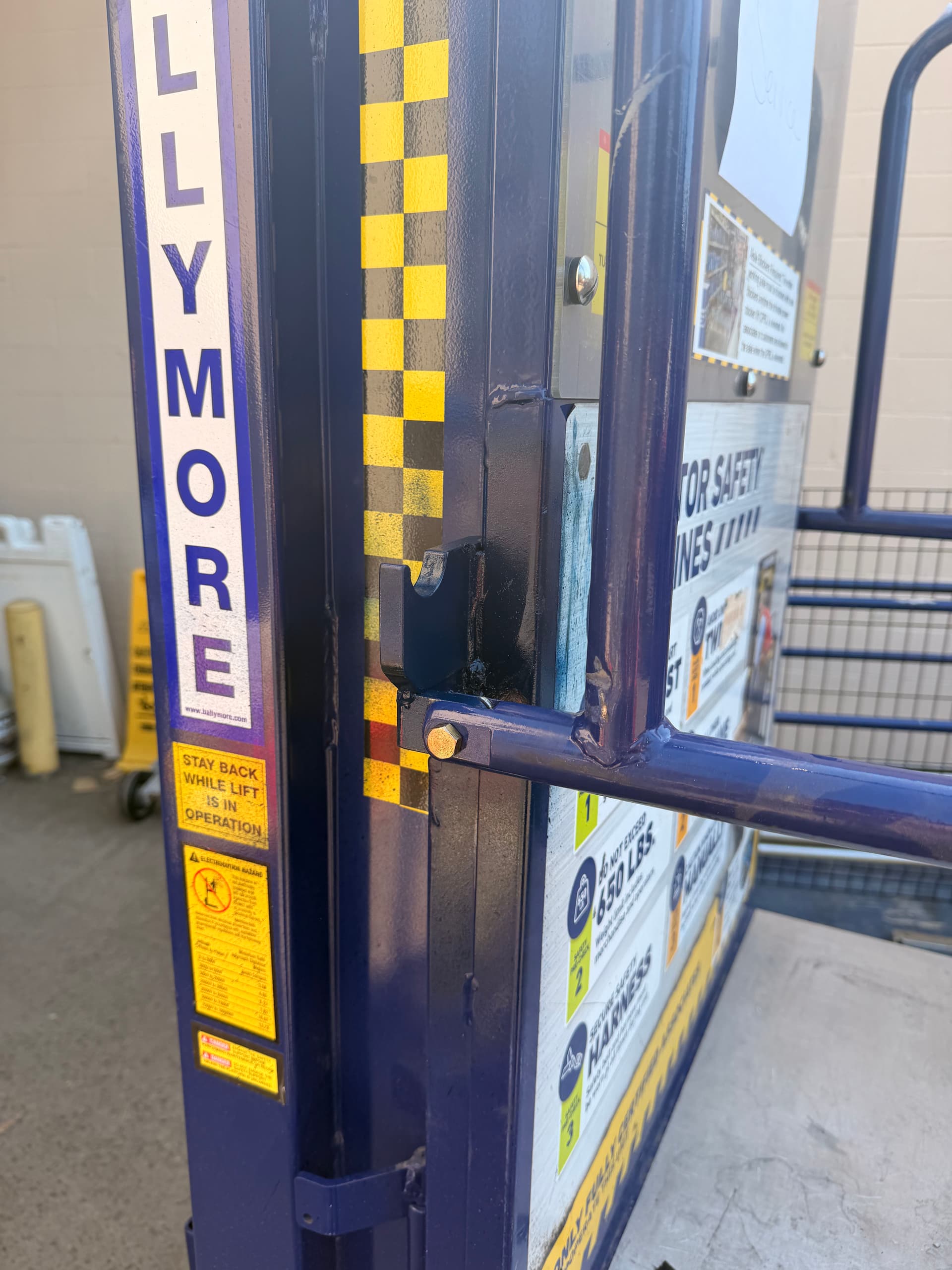 Same-Day Welding Repair on a Lift Safety Door Bracket image