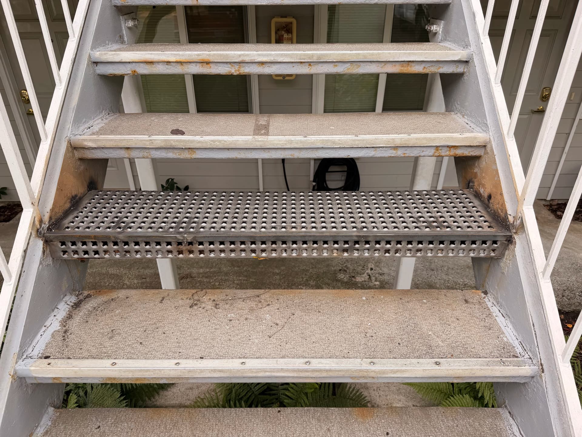 Rotten Stair Tread Replaced with Metal Upgrade in Fairhaven